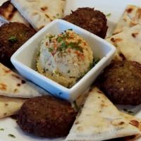 Falafel Appetizer · Vegan, gluten-free. Patties of ground chickpeas and beans, blended with herbs, spices and on...