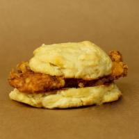 Chicken Biscuit · Fried chicken tender on a biscuit w/ honey butter and cheddar cheese