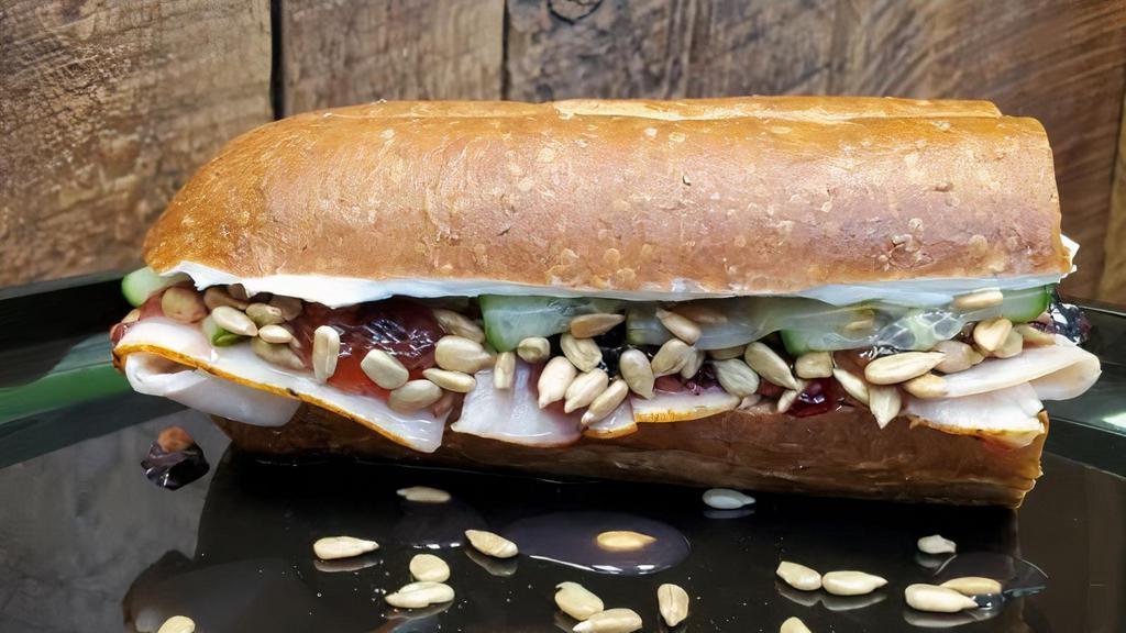 Berry Bird · Boars head oven roast turkey, genoa salami, havarti dill cheese, cranberry or cream cheese spread, lettuce, sunflower seeds and tomato. “Gobble it up.”