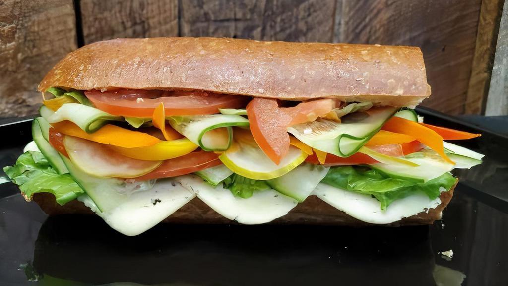 The Carpet Ride · We will find the best vegetables in season to craft a delicious veggie garden on a hoagie. topped with havarti dill cheese, lettuce, shaved pickle and a balsamic glaze. “Yes it’s magic.”