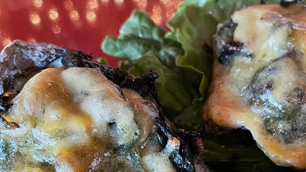 New! Oysters Rockefeller · Classic jumbo oysters topped with house-made creamy spinach and parmesan cheese.