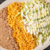 Carne Enchilada · Served with rice, beans, homemade tortillas, and salad.