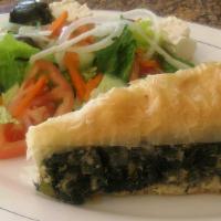 Spinach Pie · Crispy flanky phyllo dough stuffed with spinach onions feta and herbs.