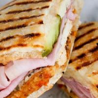 Classic Panini · Ham and Cheese.  Served w/ French Fries. Substitute to onion rings or sweet potato fries add...