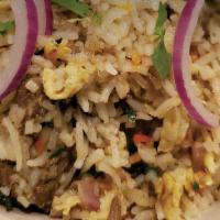Kadai Biryani · Seasoned basmati rice, your choice of chicken or lamb, scrambled egg, fine chopped green oni...