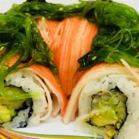 Tysons Roll · Crabstick, avocado, cucumber, spicy mayo and seaweed salad.