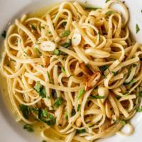 Linguini Alla Contadina · linguini pasta with broccoli, garlic, oil, hint of tomato, fine herbs, and spices.