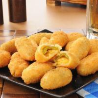 Jalapeno Poppers · Served with cream or cheddar, served with raspberry sauce or ranch dressing.
