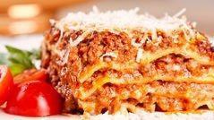 Baked Lasagna · Served with garlic bread.