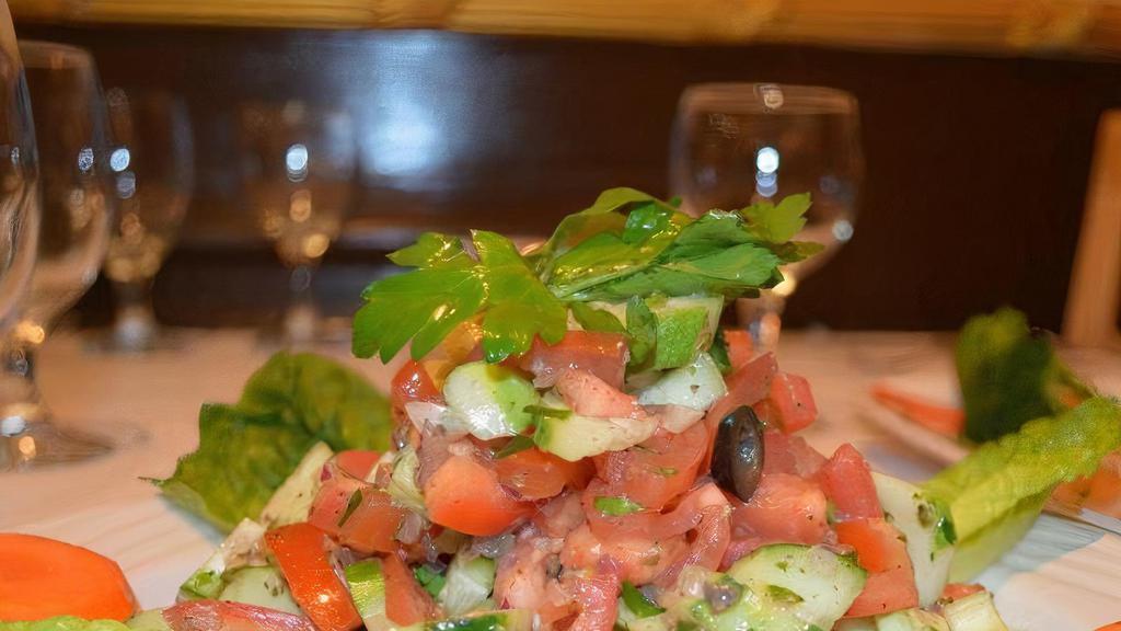 Shepherd'S Salad · Fresh tomatoes, cucumbers, onions & parsley w/ chef's dressing. Gluten free and vegan.