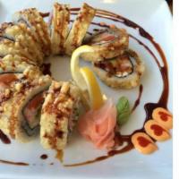 Las Vegas Roll · Deep fried
IN- Four kinds of fish, avocado, crab, and cream cheese 
SAUCE- Eel sauce