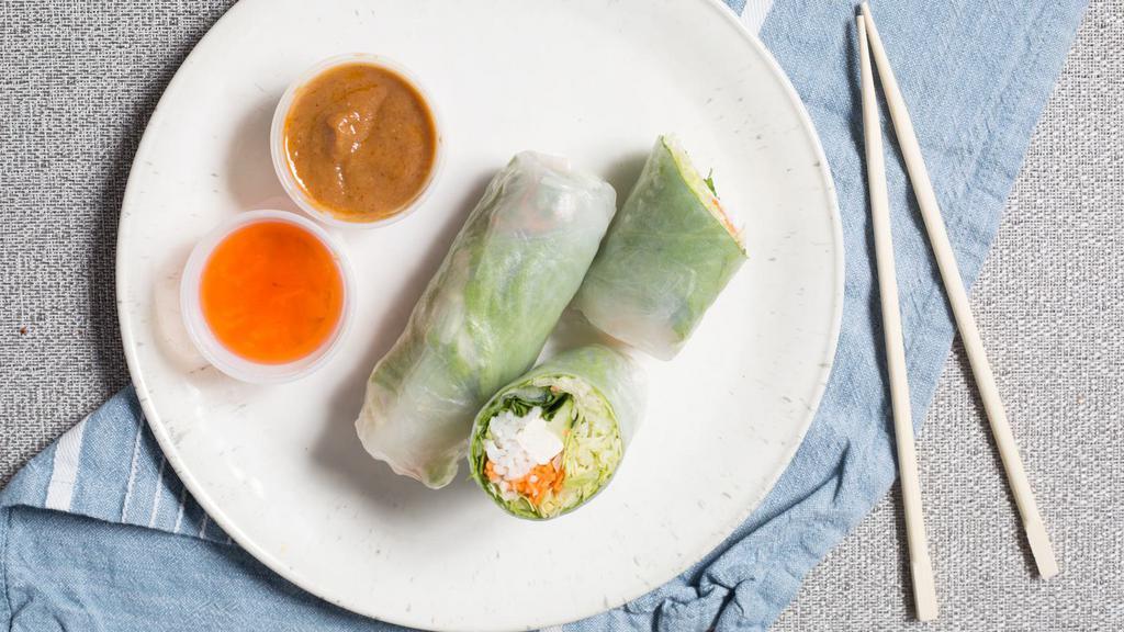 Fresh Spring Rolls · Vegan, gluten free. Fresh spring veggie rolls with rice noodles, tofu, cilantro, carrots, cucumbers, and lettuce, wrapped in rice paper. Served with homemade peanut dip and pineapple sauce.