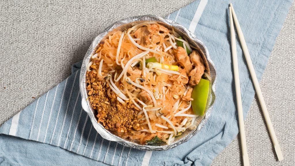 Pad Thai · Vegan, gluten free. Rice vermicelli, tangy tamarind sauce, fresh bean sprouts, green onions and crushed peanuts.