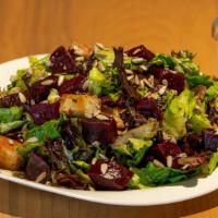 Classic Beet · Tender mixed greens, local beets, house-made ciabatta croutons and sunflower seeds- tossed i...
