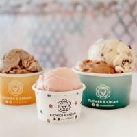 Two Scoops · One or Two flavors in a cup. 
Toppings and cones may come a la carte.