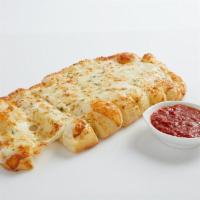 Garlic Cheesy Bread · Our homemade, fresh dough brushed with delicious garlic butter and topped with 100% whole mi...
