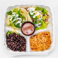 Taco Platter · Comes with cilantro-lime rice, black beans, pinto beans, mild or hot salsa, cheese, sour cre...