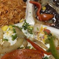 Fajita · Comes with cilantro-lime rice, black beans, pinto beans, mild salsa or hot salsa, cheese, so...
