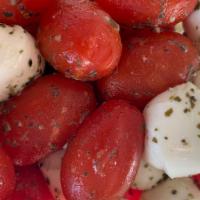 Bocconcini & Tomato Salad · Mozzarella cheese, pesto sauce (nut allergen free), chopped basil, evoo, vegetable oil and s...