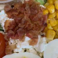 Cobb Salad Lg · A mix of freshly cut romaine lettuce,  hard boiled eggs, cucumber, goat cheese, crispy bacon...