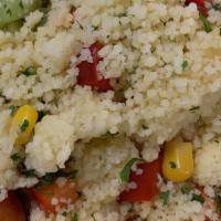 Couscous Salad · Couscous, red peppers, celery, parsley, cherry tomatoes, corn and salt. Can't go wrong!