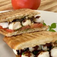 Caprese Sandwich · Fresh mozzarella, basil, tomatoes, and pesto aioli.