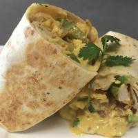 Burrito · Two flour tortillas filled with choice of meat, scrambled eggs, peppers, onions, tomatoes, c...