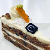 Carrot Cake · Coconut carrot cake, walnuts, and cream cheese filling.