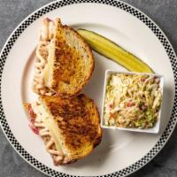 Reuben Grilled On Rye · Served with your choice of one Side Salads.