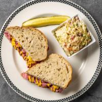 Corned Beef On Rye · Served with your choice of one Side Salads.