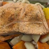 Steamed Salmon And Vegetables In Garlic Butter Sauce · Our sushi-quality Canadian salmon served with fresh vegetables in our savory garlic butter s...