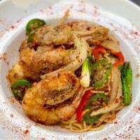 Shrimp Garlic Noodles · Garlic noodles, red bell peppers, yellow onions, scallions.