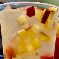 Mango Tango Tea · Lightly sweetened mango black tea, rainbow jelly & fresh fruit bits  | ICED |  24oz