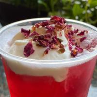 Roses & Cream · Rose infused tea with touch of sour hibiscus flavors, lightly sweetened, topped with cream a...