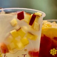 Lychee Breeze Tea · Lightly sweetened black tea with lychee jelly and fresh fruit bits  |  ICED |  I24oz