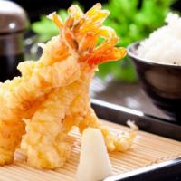 Shrimp Tempura (5) · Crispy lightly battered shrimps (5) with light soy dipping sauce.
