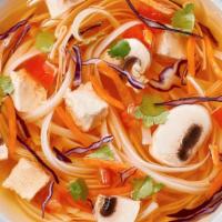 Spicy Lemongrass Soup · Spicy lemongrass (vegetable) broth, rice noodles, cabbage, carrots, tomatoes, mushrooms, cil...
