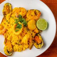 Paella Veracruzana · Traditional Spanish rice with mussels, shrimps, squid, scallops, chorizo and chicken.