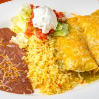 Chicken Enchilada · 2 rolled corn tortillas with melted cheese served with refried beans, rice, lettuce, pico de...