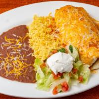 Chicken Burrito · A large flour tortilla with chicken and melted cheese. Topped with green tomatillo sauce and...