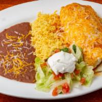 Vegetable Burrito · A large flour tortilla with vegetables and melted cheese. Topped with ranchera sauce and ser...