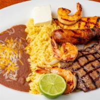 Acapulco Grilled Parrillada · Grilled house selection (beef, chicken, shrimp and Spanish sausage chorizo). Served with ric...