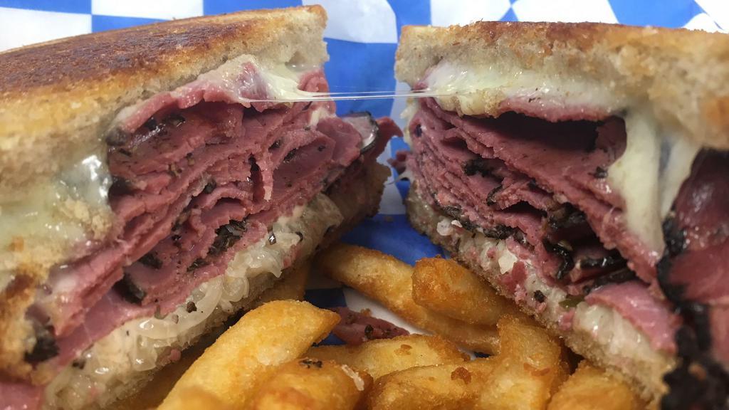 Pastrami Reuben · Lean pastrami, swiss, homemade 1000 island and sauerkraut on grilled rye.