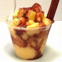Mangonada · Mango nieve topped with diced mango, chilito, chamoy sauce and tamarind straw