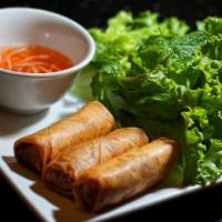 A1 Chả Giò - Egg Rolls · Crispy rolls made with ground pork, clear noodles, carrots, and taro. Served with lime chili...