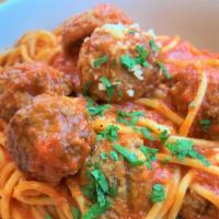 Spaghetti Meatballs · Spaghetti and beef meat balls in tomato sauce, topped with Parmesan cheese.