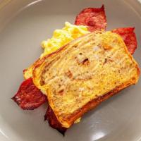Brioche French Toast Sandwich · Cinnamon Brioche With eggs & Turkey Bacon!