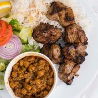 Lamb Kabob · Tender marinated lamb in house spices, grilled and served with basmati rice, chickpeas and n...