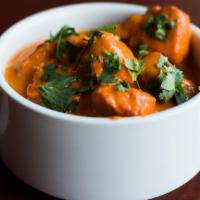 Chicken Tikka Masala · Barbequed chicken cooked in tomato sauce served with basmati rice.