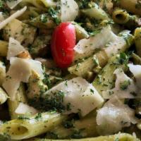 Penne Pesto · Grilled chicken breast, Sauteed mushrooms, Shaved parmesan, Basil pesto sauce over penne pas...